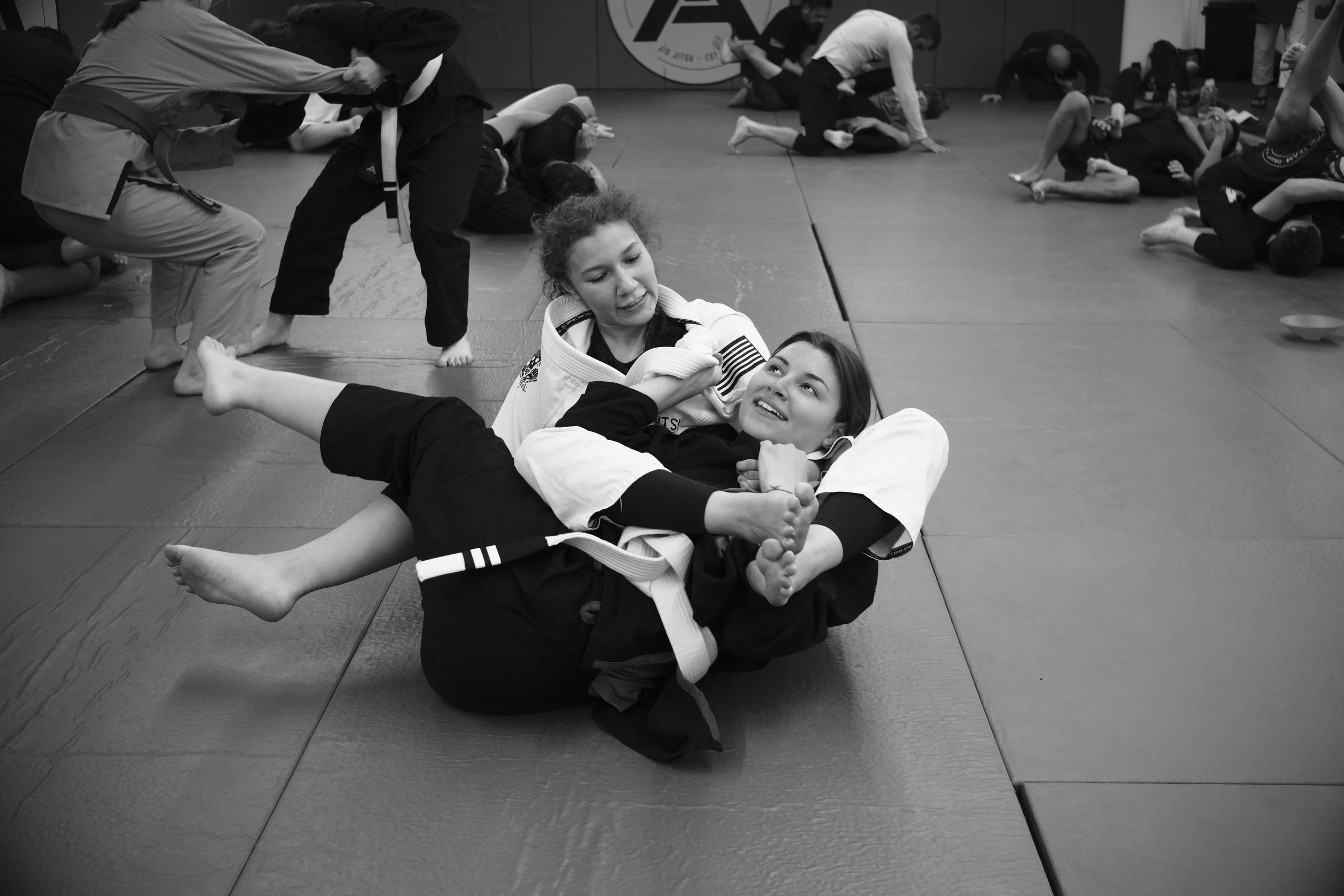 Professor Ana demonstrating a bow and arrow choke.